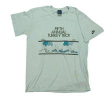 Load image into Gallery viewer, Vintage NIKE Fifth Annual Turkey Trot Spell Out Swoosh T Shirt 80s White L