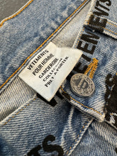 Load image into Gallery viewer, VETEMENTS All Over Print Logo Denim Jeans Light Blue Pre-Owned M
